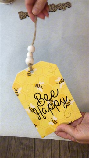 In case you missed it, here’s how I made this cute little wood tag using a napkin! 🐝😊 #diyideasforhome #diyhomedecor #easycraftideas #diycraftideas #woodsignmaker #beehappy #decoupagenapkins #DIYInspiration #DIYTutorials | Rusty Roost Designs