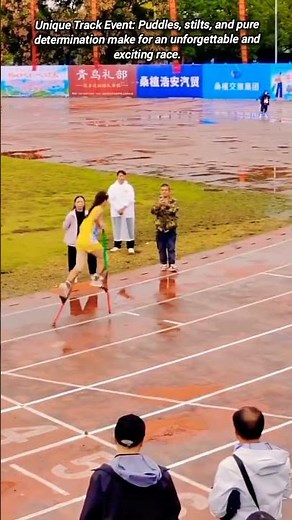 ​High-Stepping Triumph: Athlete Masters Stilt Racing in the Rain.