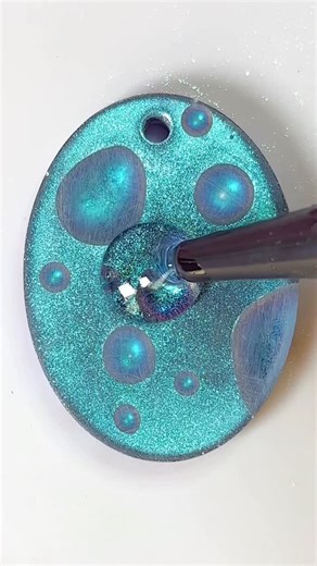 Pearl Drop Studio on Instagram: "💧 Glass-like Water Drop Pendant Tiny drops frozen in time ✨ I love how light bends through this piece, it looks simple, but the depth is everything. Supplies I use are linked in my bio. #uvresin #reels #satisfying #viral #fyp"