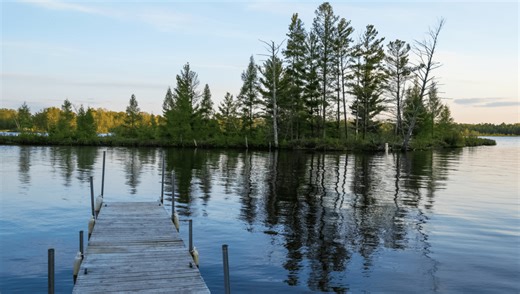 A Floating Bog Island Blocks A Bridge In Chippewa, So Locals Move It With Boats