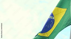 Brazilian flag waving in the wind in slow motion in Rio De Janeiro, Brazil