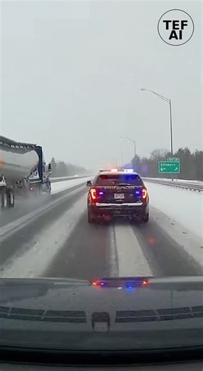 BOISE, IDAHO METRO AREA Dashcam footage from an icy roadway in the Boise area shows a gas tanker truck losing traction and sliding out of control as winter conditions make braking and steering ineffective. Moments later, a police cruiser following behind also loses traction and begins sliding on the slick pavement. The video shows both vehicles drifting toward the center of the roadway before striking the median as drivers attempt to regain control. Icy conditions and freezing temperatures appea