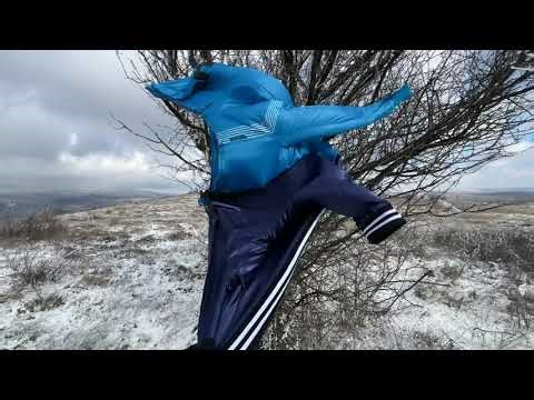 Nylon and satin jackets in strong wind