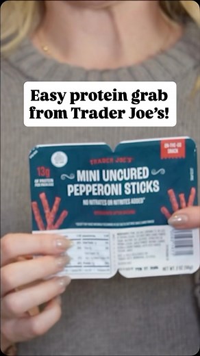 Natasha Fischer on Instagram: "New snack alert for $1.99 and this one is perfect for those “I’m starving but dinner is still far away” moments. These mini pepperoni sticks are salty, satisfying, and surprisingly filling, with 13g of protein per pack. I love that they’re split into two portions so you can snack now and save some for later. Easy to toss in a bag, keep in the fridge, or pair with cheese and olives for a quick snack plate. Simple, savory, and very snackable. #traderjoeslist #traderj