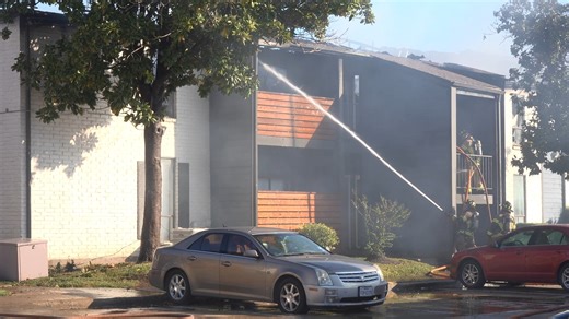 Maintenance staff helped residents jump from a window to escape a two-alarm fire that destroyed 16 units at the Corridor at Westchase apartment earlier today | Houston Stringer