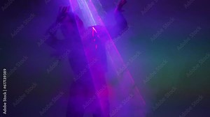 Girl dancing in laser lights and smoke. Dance show with the use of flickering light effects.