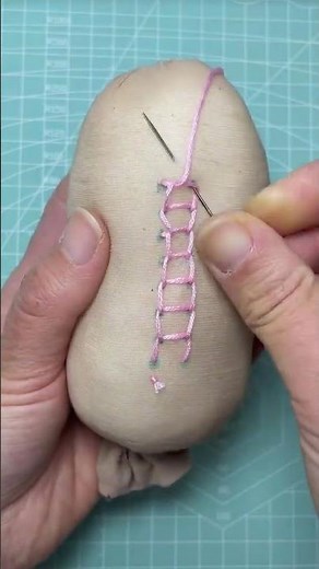 the process of sewing a cushion using a certain technique to form a pattern