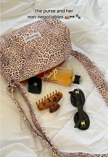 fashion meets function with our barrel pouch in Wild Side🖤🐆 what are your purse essentials? #blackboughswim #whatsinmypurse #whatsinmybag #bagessentials #cutebag #cutepurse #styleinspo #leopardprint