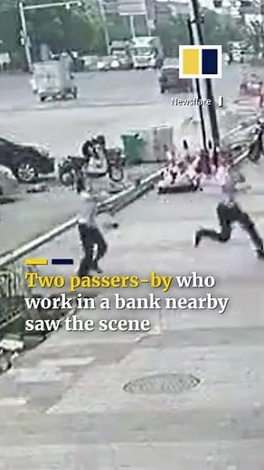 Heroic man catches falling toddler in China #shorts