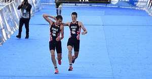Selfless athlete gives up his chance at victory to help carry his brother across the finish line