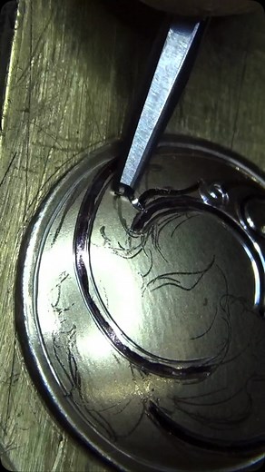 Im working on engraving the leaf shapes on this raised dome piece. I’m using a 120 graver for these leaf outlines. There are still a few spots left in the Oct 13-17 basic engraving class if anyone is wanting to learn to engrave. The links are in my bio. #engraving #metalengraving #engravingschool #engravingcourse #jewelryengraving | Ray Cover