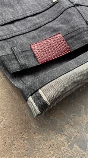 Cole Ivy on Instagram: "Crocodile Japanese Selvedge Slub Indigo -100% 14.5 oz traditional shuttle loom cotton fabric with “self edge” -Dark red leather emboss crocodile patch -Cole Ivy “silk feel” pockets -Custom insignia engraved gunmetal buttons"