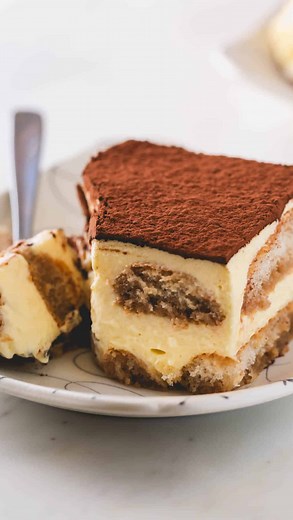 4.2K views · 14 reactions | ✨ NEW ✨ Tiramisu ✨ Luxuriously smooth and creamy mascarpone filling in between layers of ladyfingers soaked with bold espresso and Amaretto mixture. This tiramisu is made traditional way using egg yolks! Read: it’s unbelievably rich and indulgent, just the way it should be! A must-try recipe for sure! DM me for the recipe link #tiramisu #authentictiramisu #tiramisucake #tiramisurecipe #howtomaketiramisu | Sweet & Savory | Facebook