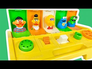 LEARNING NUMBERS and COUNTING Sesame Street Yellow POP Up Toys