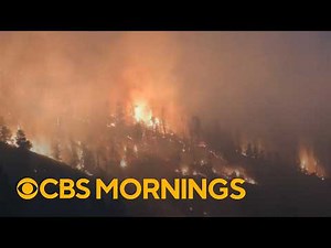 Wildfires in Colorado rapidly spread, destroying buildings and forcing evacuations