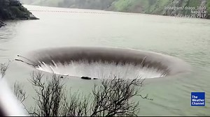It's like a tub drain -- in the middle of a lake! This spillway is 72 feet wide, 200 feet deep, and totally mesmerizing. | The Weather Channel