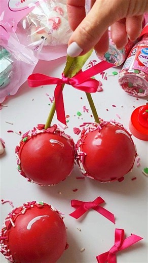 Cherry Cakes 🍒 Literally!😍 I made the cherry shells with red candy melts, filled with the Cherry Hearts Sprinkle Mix, my signature chocolate cake bits, cherry flavored swiss meringue buttercream, and added the matcha pocky sticks as stems, wafer paper leaf, and silk coquette bow 🎀🍒 Happy an amazing Wednesday, friends!💝 #cherrycake #chocolatecake #chocolatetreats #sprinkles #valentinesday #cherries #cherry #cherrycake #cherrycakes #chocolate #cake #chocolatecake #buttercream #cakeinspo #cake