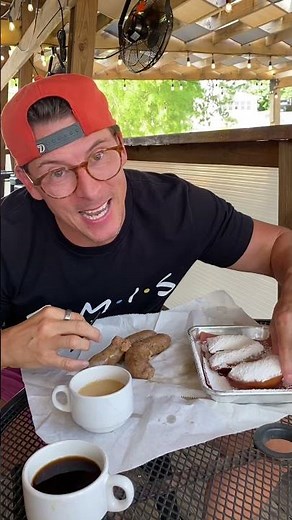 Cajun breakfast done right: boudin, beignets or donuts, a coke, and coffee milk.