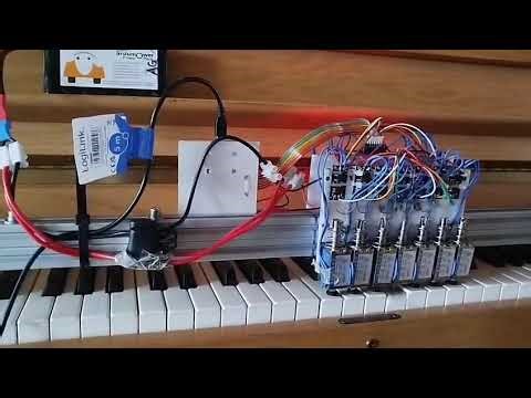 DIY portable self-playing piano player device on a Wurlitzer piano - First test :-)