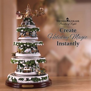 Lights, Music, Motion! Christmas Eve comes to life on this tabletop tree. Shop Now! | The Bradford Exchange