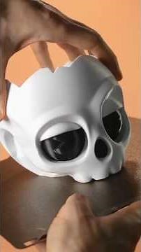 I designed a 3d printable skull planter that purges out the extra water