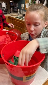 1.4K views · 223 reactions | Family Balloon Hit Christmas Game  Kids, Dad, Mom, and family play family christmas game for festive holiday prizes with balloons and Santa buckets. Great game for family gatherings or Christmas parties. This video was produced by Aaron & Jess, Network Media, and Benson Bros. (for entertainment purposes only) | Aaron & Jess | Facebook