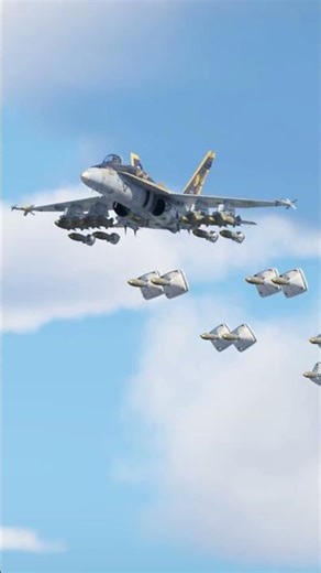 Fighter Jet Drops Massive Bomb Load Mid-Air