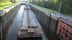 the movement of ships and barges along the canal through the river gateway
