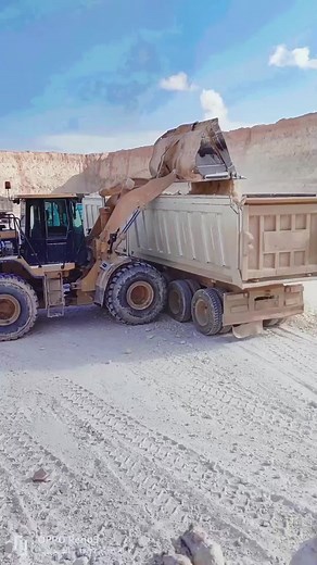 Caterpillar Front Loader in Action at Construction Site