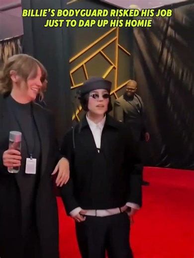 Billie’s bodyguard forgot he was on duty for a second!