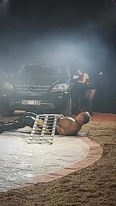 😳 #BVIRAL (@circusstrongman) Circus Strongman Showcases Incredible Feat under Moving Car | Best Videos