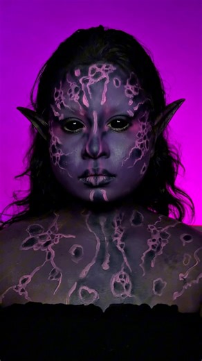 Inspired by the Harlequin toad — rare, radiant, and dangerously stunning. 🐸💜 Halloween felt like the perfect time to bring her magic (and madness) to life. #HarlequinToad #HalloweenMakeup #FacepaintArt #FantasyMakeup #SFXMakeup #CreativeMakeup #WildlifeInspired #MakeupTransformation #HalloweenLooks #PurpleMakeup #ArtOnFace #MUACommunity #SpookySeason #ScleraLens #MakeupInspiration #MakeupArtistry #CosplayMakeup #NatureInspired #ViralMakeup #MakeupMagic | Gulfam Shahana Jana