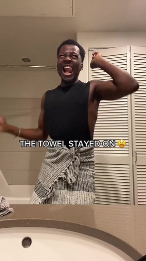 Muscular Man Shows Off in Bathroom Video