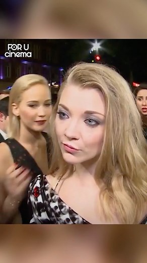 Jennifer Lawrence Accidentally Kissed Natalie Dormer at ‘Hunger Games’ Premiere 💋 Jennifer Lawrence has a habit of sneaking up on her friends being interviewed on the red carpet, but her mischief took an unexpected turn this week when she did it to “The Hunger Games: Mockingjay – Part 2” co-star Natalie Dormer. At the London premiere of their new film, Dormer was in the middle of an interview when Lawrence tried plant a kiss on her cheek — but Dormer turned her head at the last second to greet