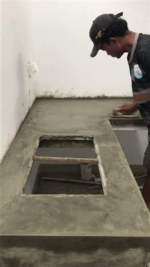 modern kitchen table: cement plaster kitchen table