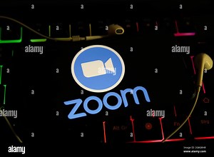 Viersen, Germany - June 1. 2021: Closeup of phone screen with logo lettering of zoom video communication service on computer keyboard Stock Photo - Alamy