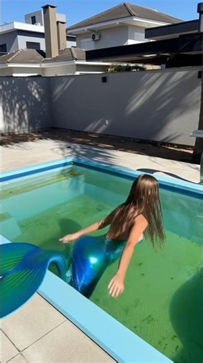 THERE IS A MERMAID IN MY POOL