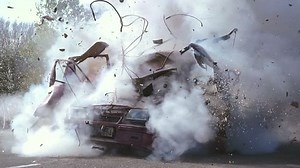 clip-1019794603-car-explosion-on-road-slow-motion-burning