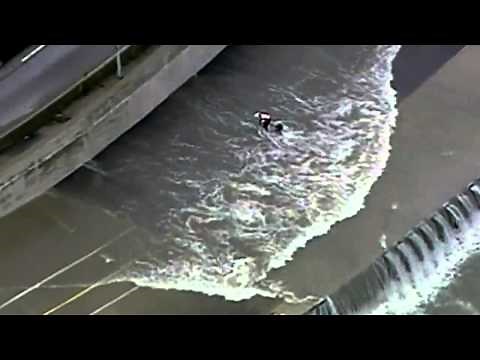 HUGE WAVES: Joggers ambushed by walls of water