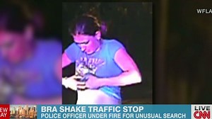 Woman told to lift bra at traffic stop