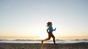 Fitness Woman Runner Running On Beach Stock Footage Video (100% Royalty-free) 1009556135 | Shutterstock
