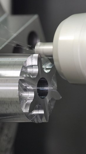 Machining with Synchronized Motion using Tungaloy's AddDoFeed and AddForceCut! 🔥 AddDoFeed Shank: EXN02R062U0062-04 Insert: LNMU0202ZER-MM AddForceCut Blade: QSG82-3T Holder: CHTBL2525-82 Insert: QGS3-020 AH7025 Cutting Parameters: Helical Milling: Vc = 492 sfm (150 m/min), fz = 0.020 ipt (0.5 mm/t), f = 220.5 ipm (5600 mm/min), DOC = 0.008" (0.2 mm), RPM = 2900 min⁻¹ Parting-off Machining: Vc = 197 sfm (60 m/min), f = 0.006 ipr (0.15 mm/rev) #cnc #machining #cncmachine #engineering #tools #tun