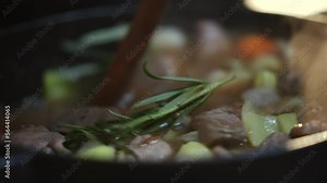 Hot pot simmering in cast iron pot