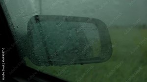 Foul Weather on Road, Storm Warning, the Driver Waits Bad Weather in the Car, the Wiper Can Not Cope With the Rain