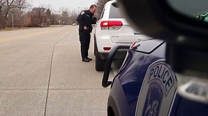 Local 4 Defenders ride along with Troy police officer busting distracted drivers