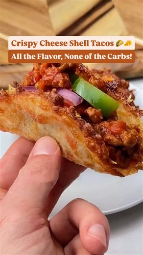 Crispy Cheese Shell Tacos 🌮🧀 A brilliant low-carb hack for taco lovers! These crispy, crunchy, cheesy shells are the perfect vessel for all your favorite fillings, any time of day. 😋 🚨 Full recipe with tips, variations, and nutrition info: ➡️ https://keto.recipes/crispy-parm-tacos-italian-take-on-a-mexican-classic/ What You Need: 🧀 2 cups shredded mozzarella 🧀 1 cup grated Parmesan cheese 🌶️ Your favorite fillings! (e.g., seasoned ground beef, shredded chicken, Italian sausage, veggies, e