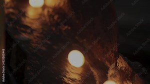 Production of metal balls in a factory, movement of hot balls, rolling metal balls, slow motion