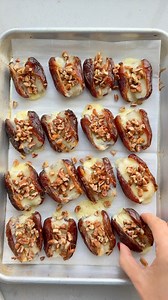 Have you ever baked dates? Here’s a fun appetizer for Thanksgiving and holidays that’s so easy to pull together. You can assemble and pop in the oven 5 minutes before guests arrive. #bakeddates #thanksgivingappetizers #holidayappetizers #daterecipes #palestiniandates #medjooldates INGREDIENTS 16 Medjool dates, pitted 1/2 (8-ounce) block sharp cheddar cheese, sliced into 16 pieces 1/3 cup chopped pecans (16 teaspoons) >> Bake at 350°F until the cheese melts and the date softens, 5-7 minutes. | Fe