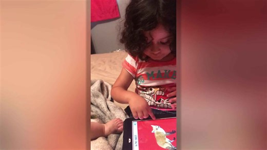 Siblings learn sign language from their deaf sister