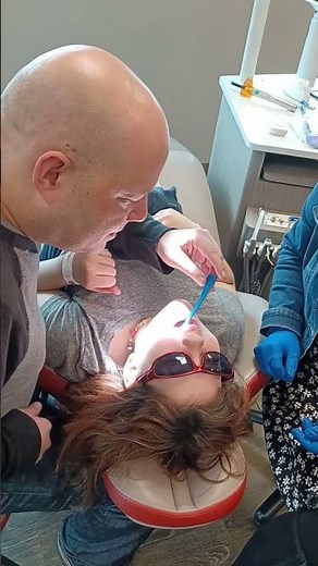 Alissa Getting the First Palate Expander Turn by Dad